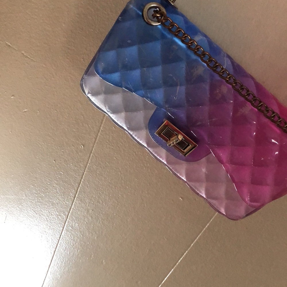 Very pretty , purple blue purse .